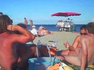 Milf Blows Her friend On Nude Beach By Voyeurs